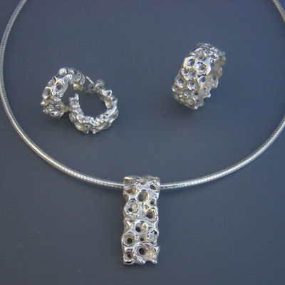 E.701(oorbellen) / C. 401(collier) / R.008(ring): Zilveren set met citrien.