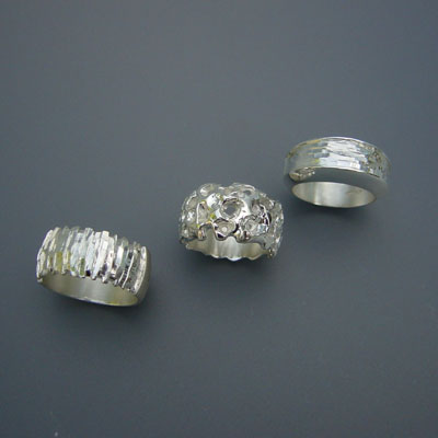 R.018. / R.019. /R.020:Zilveren ringen met struktuur.
