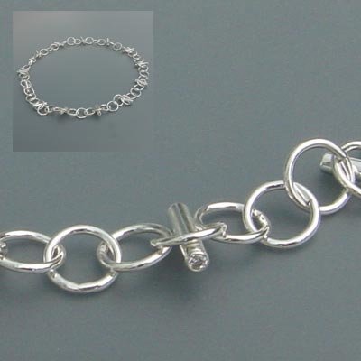 Zilveren armband met zirkonia en bijpassend collier.